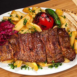 Image of ARGENTINIAN SKIRT STEAK with garlic fries